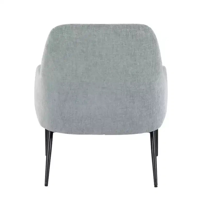 Sillón tapizado, estructura de metal negro, azul claro